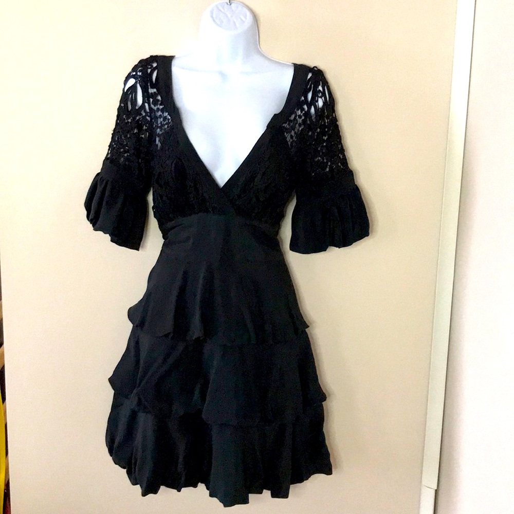 Ruffled, high waisted,lace back,low-cut front.